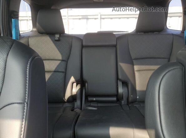 5FNYF8H95PB501125 2023 HONDA PASSPORT Blue Vista de los asientos traseros