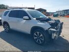2023 Honda Pilot 2wd Touring White vin: 5FNYG2H71PB013735