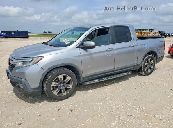 5FPYK2F69HB003178 2017 HONDA RIDGELINE Silver Vista tres cuartos delantera izquierda
