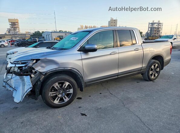 5FPYK3F50HB025955 2017 HONDA RIDGELINE Silver Vista tres cuartos delantera izquierda
