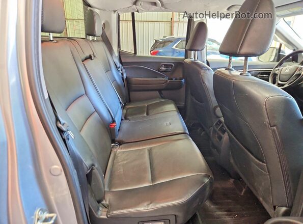 5FPYK3F55HB011159 2017 HONDA RIDGELINE Silver Rear seats view