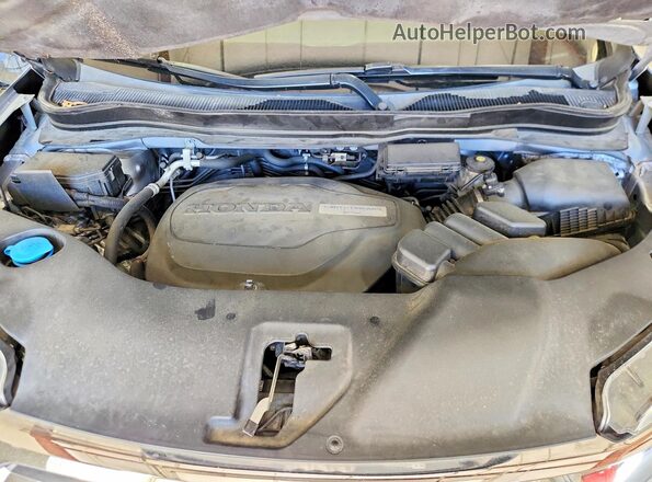 5FPYK3F55HB011159 2017 HONDA RIDGELINE Silver Rear interior view