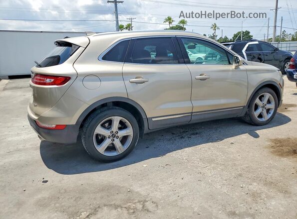 5LMCJ1C91HUL09595 2017 LINCOLN MKC Beige Trasero derecho