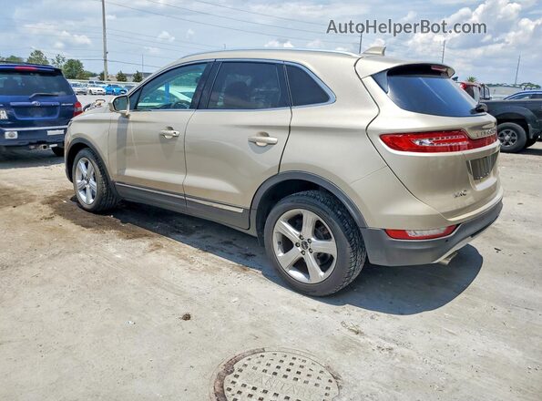 5LMCJ1C91HUL09595 2017 LINCOLN MKC Beige Trasero izquierdo