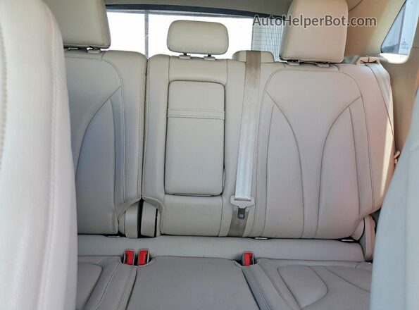 5LMCJ1C91HUL09595 2017 LINCOLN MKC Beige Vista de los asientos traseros