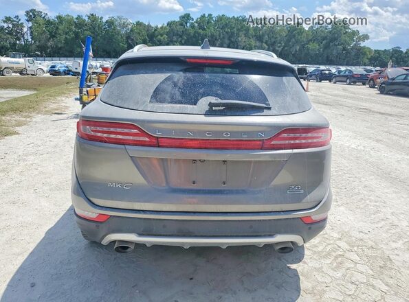 5LMCJ1C95GUJ27803 2016 LINCOLN MKC Бежевый Вид сзади