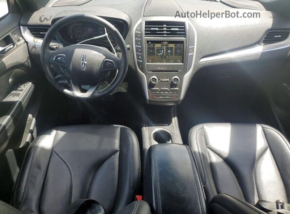 5LMCJ1C95GUJ27803 2016 LINCOLN MKC Бежевый Вид панели приборов