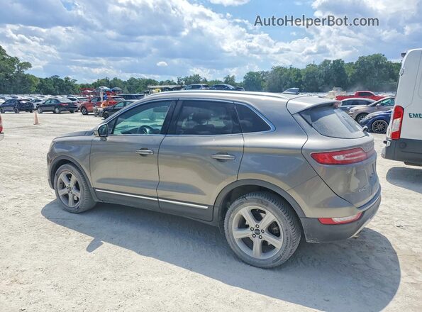 5LMCJ1C95GUJ27803 2016 LINCOLN MKC Бежевый Задняя левая четверть