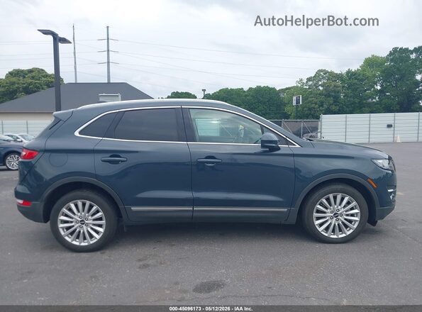 5LMCJ1C97KUL33830 2019 LINCOLN MKC Бирюзовый Вид задней части салона