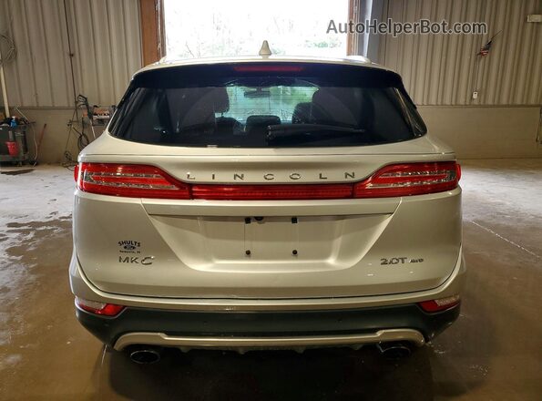 5LMCJ1D92HUL46671 2017 LINCOLN MKC Серебряный Вид сзади