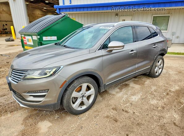5LMCJ1D93GUJ15180 2016 LINCOLN MKC Желто-коричневый Передняя левая четверть