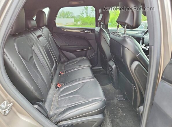 5LMCJ1D93GUJ15180 2016 LINCOLN MKC Желто-коричневый Вид задней части салона