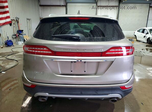 5LMCJ2D90KUL30367 2019 LINCOLN MKC Brown Vista trasera