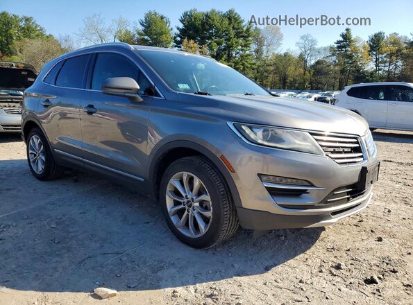 5LMCJ2D97HUL16958 2017 LINCOLN MKC Коричневый Передняя правая четверть
