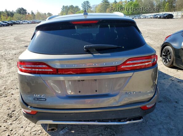 5LMCJ2D97HUL16958 2017 LINCOLN MKC Коричневый Вид сзади