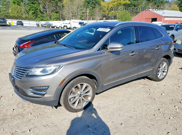 5LMCJ2D97HUL16958 2017 LINCOLN MKC Коричневый Передняя левая четверть