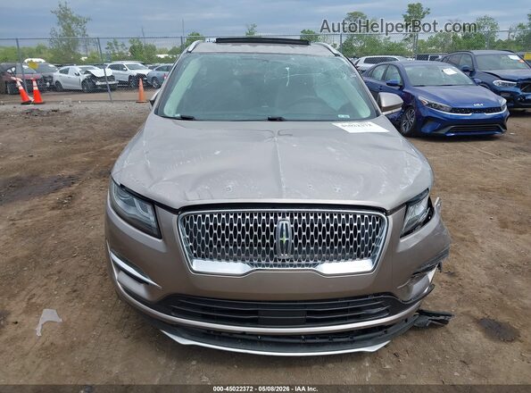 5LMCJ3C91KUL25461 2019 LINCOLN MKC Tan Widok deski rozdzielczej