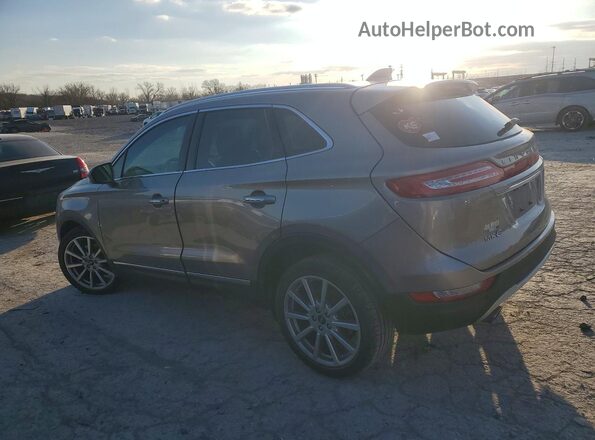 5LMCJ3C9XKUL15544 2019 LINCOLN MKC Tan Задня ліва чверть