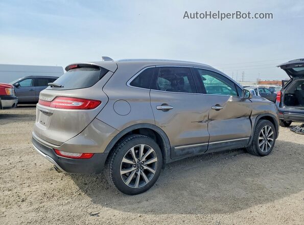 5LMCJ3D95KUL09522 2019 LINCOLN MKC Золотой Задняя правая четверть