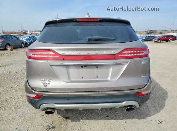 5LMCJ3D95KUL09522 2019 LINCOLN MKC Золотой Вид сзади