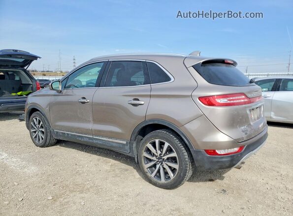 5LMCJ3D95KUL09522 2019 LINCOLN MKC Золотой Задняя левая четверть