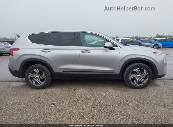 5NMS1DAJ0PH583975 2023 HYUNDAI SANTA FE Серебряный Вид задней части салона