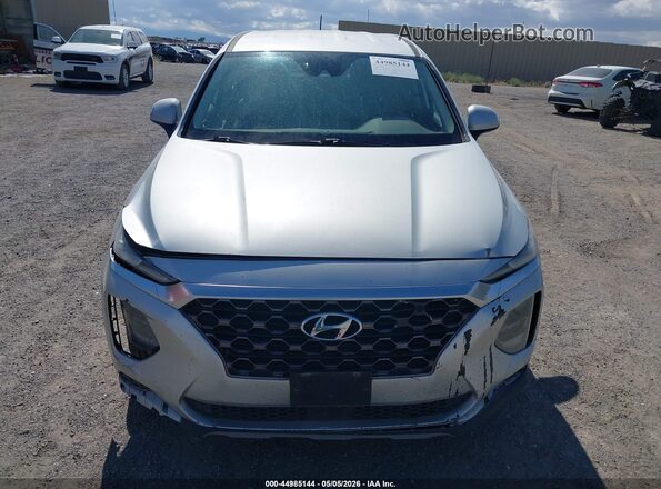5NMS2CAD7KH091180 2019 HYUNDAI SANTA FE Серебряный Вид задней части салона