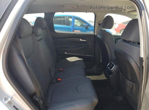 5NMS33ADXKH021752 2019 HYUNDAI SANTA Серебряный Вид задней части салона
