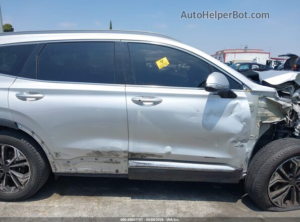 5NMS53AA2KH019865 2019 HYUNDAI SANTA FE Silver Вид задньої частини салону