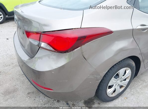 5NPDH4AE9GH700026 2016 HYUNDAI ELANTRA Желто-коричневый Вид задней части салона