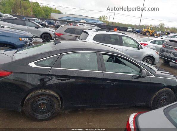 5NPE24AF2KH807118 2019 HYUNDAI SONATA Black Vista interior trasera