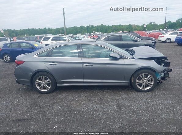 5NPE34AF2KH731445 2019 HYUNDAI SONATA Серый Вид задней части салона