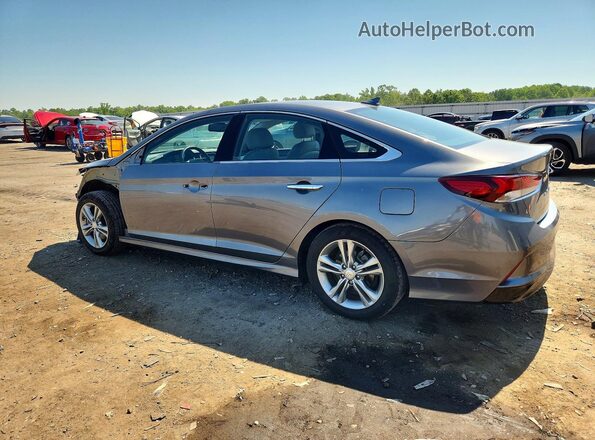 5NPE34AF5JH613985 2018 HYUNDAI SONATA Gray Trasero izquierdo