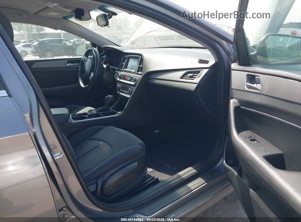 5NPE34AF8KH753045 2019 HYUNDAI SONATA Gray Vista interior delantera
