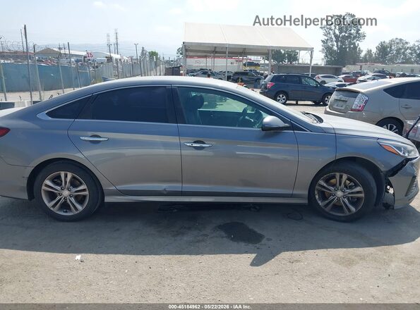 5NPE34AF8KH753045 2019 HYUNDAI SONATA Gray Vista interior trasera