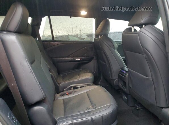 5TDABAB63SS010558 2025 LEXUS TX Gray Vista interior trasera