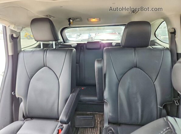 5TDDZRBH8MS141576 2021 TOYOTA HIGHLANDER White Rear seats view