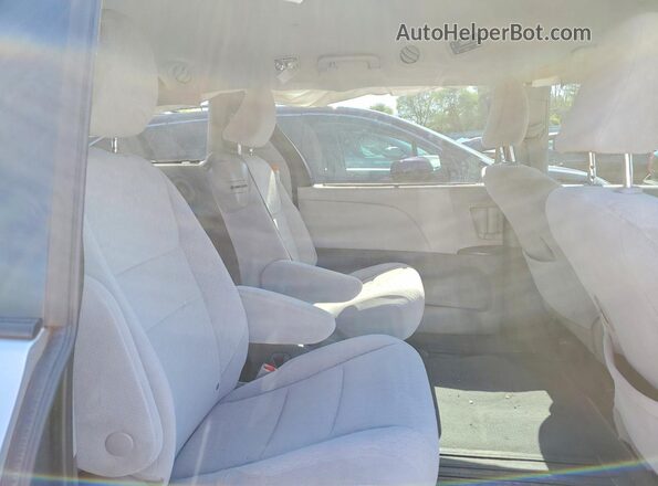 5TDKZ3DCXLS076024 2020 TOYOTA LE Silver Rear interior view