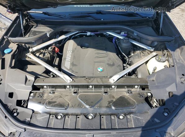 5UX13EU01R9V99596 2024 BMW X5 Green Rear interior view