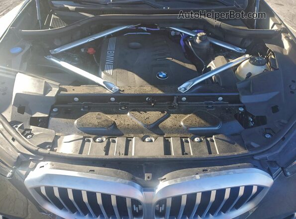 5UX13EU03S9Y91210 2025 BMW X5 Gray Widok wnętrza z tyłu