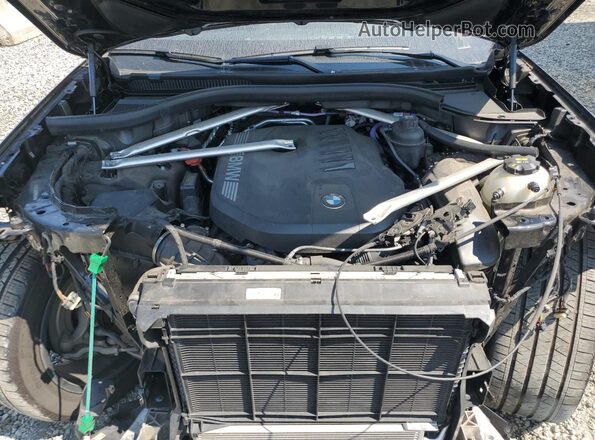 5UX23EM01P9R02975 2023 BMW X7 Black Widok wnętrza z tyłu