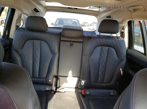 5UX23EM01R9S21296 2024 BMW X7 Black Vista de los asientos traseros