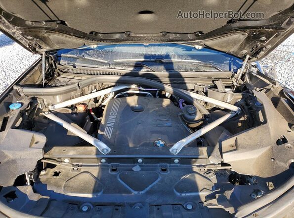 5UX23EM01R9S21296 2024 BMW X7 Black Vista del compartimento del motor