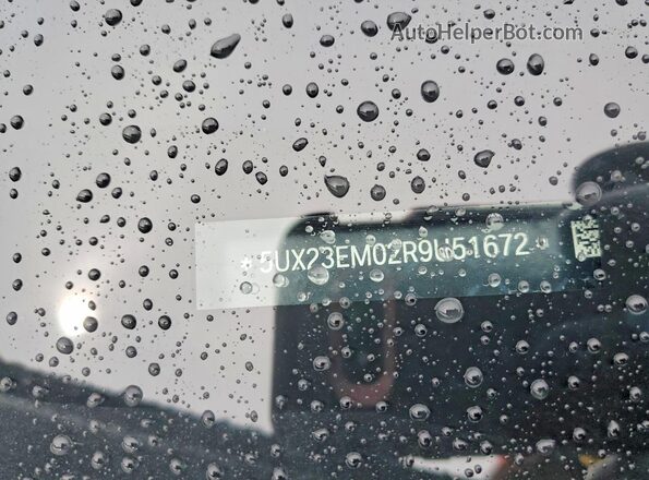 5UX23EM02R9U51672 2024 BMW X7 Gray Вид наклейки з VIN-кодом