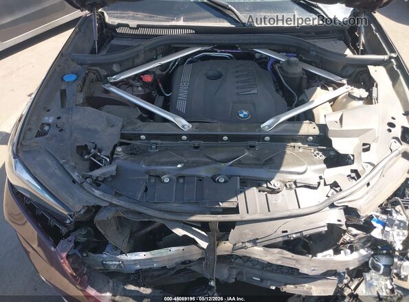 5UX23EU05R9V11802 2024 BMW X5 Burgundy Widok z tyłu