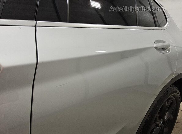 5UX2V1C07L9B46229 2020 BMW X4 Серебряный 