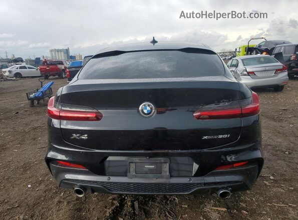 5UX2V1C07M9D82414 2021 BMW X4 Black Widok z tyłu