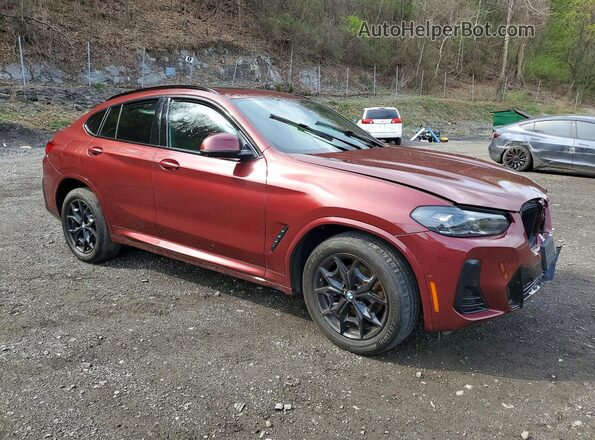 5UX33DT06P9R31386 2023 BMW X4 Red Front right