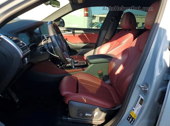 5UX33DT06P9S04894 2023 BMW X4 Gray Widok wnętrza z przodu