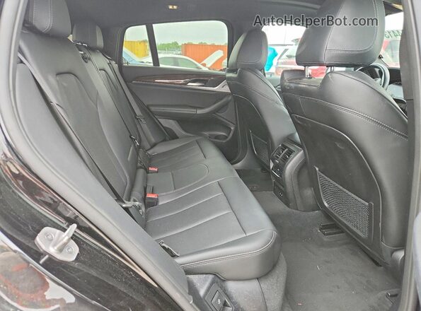 5UX33DT0XR9U84418 2024 BMW X4 Черный Вид задней части салона